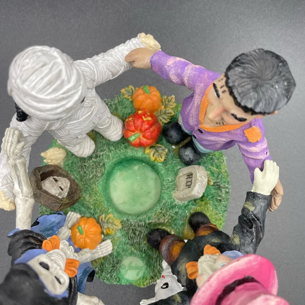 Halloween 5”w x  4”h Holding Hands Resin Circular Candle